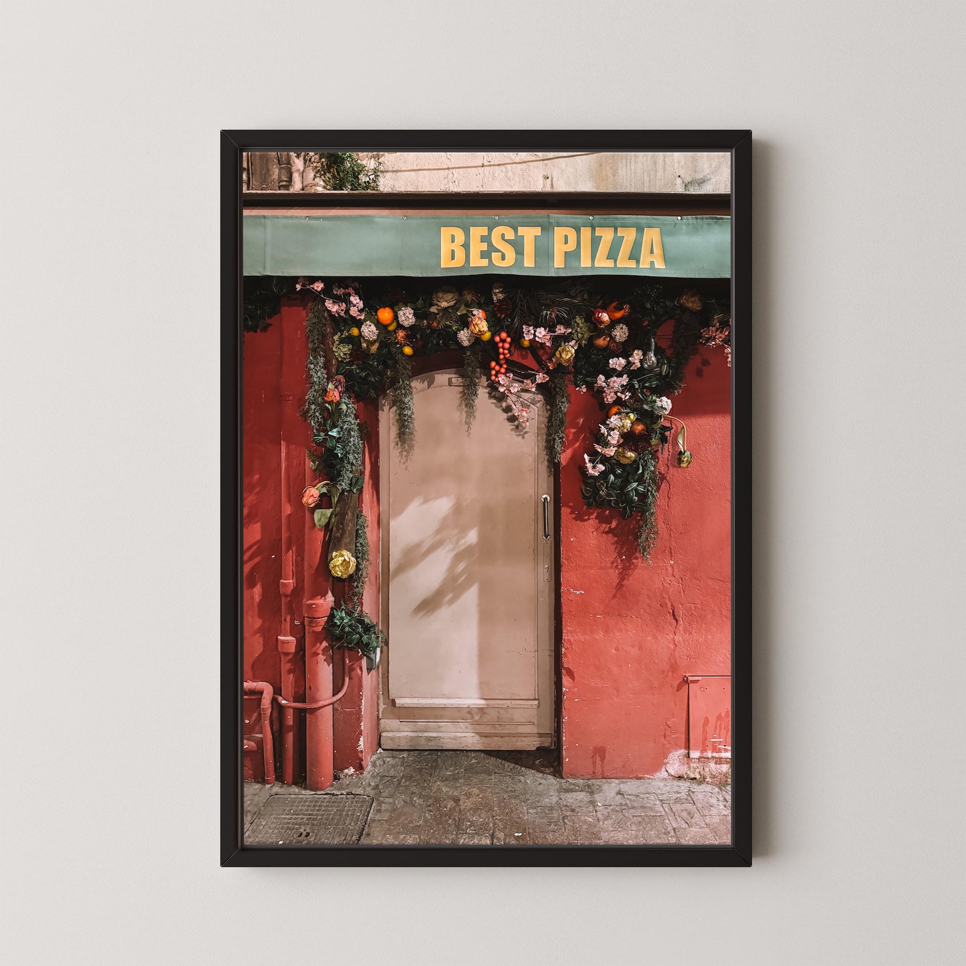 Framed print of a red pizza shop entrance with 'Best Pizza' sign.