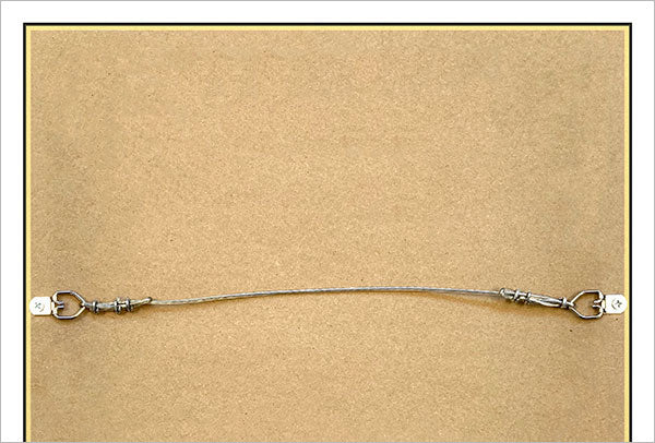 A silver-colored metal template for a picture frame, displayed against a plain background.